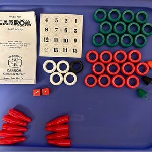 Vintage Carrom board pieces plus rule book and number discs